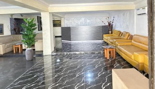 Lobby of Duban International Hotel with guests checking in